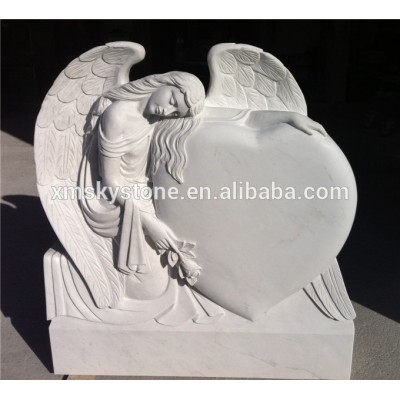 angel honed heart shaped marble tombstone